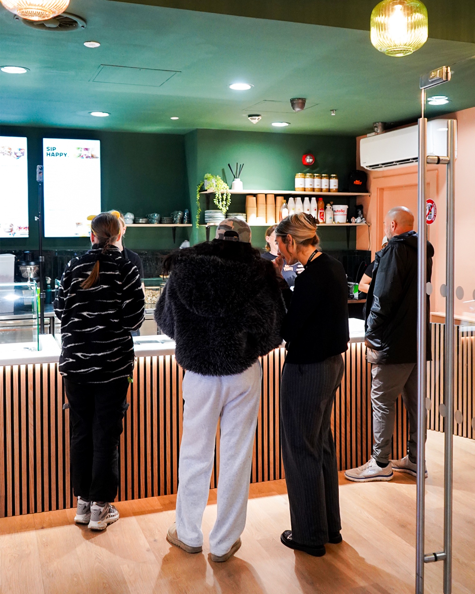 Customers at the counter of our Resorts World café